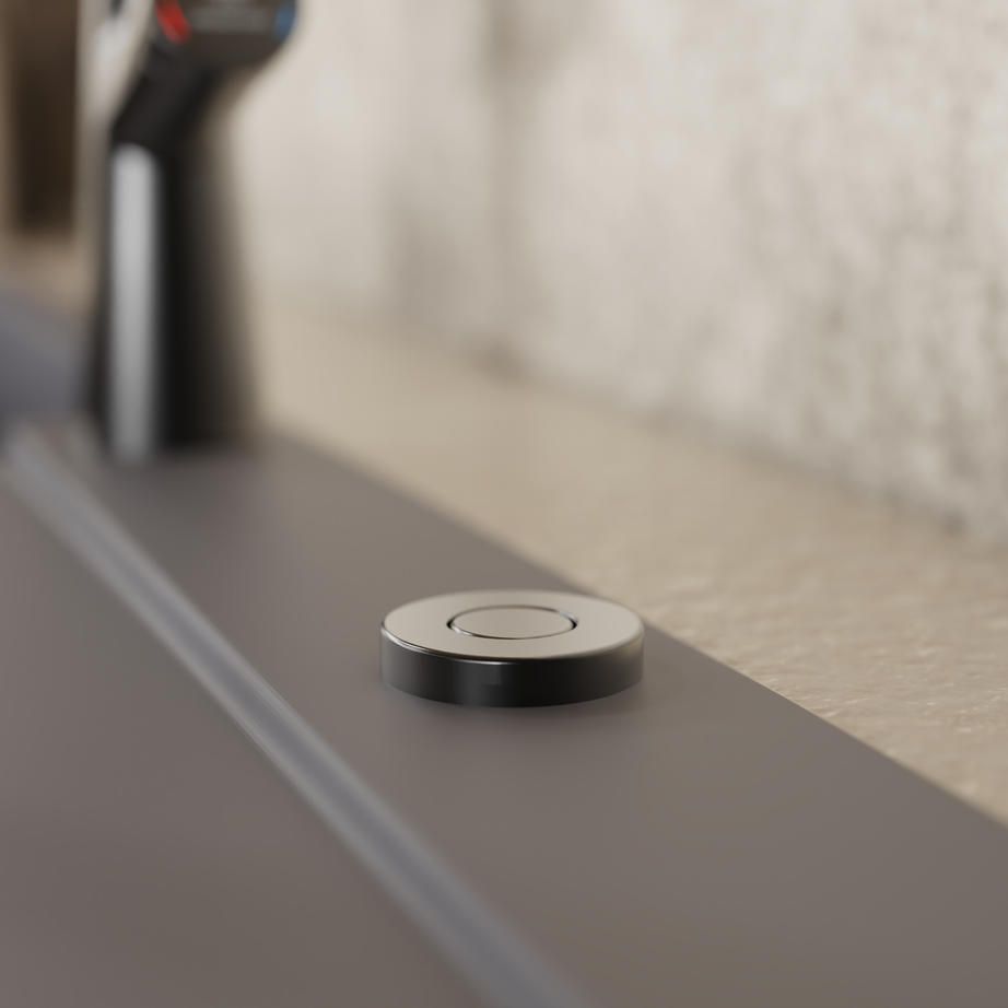 Wasserwerk disposal air switch button on a countertop
