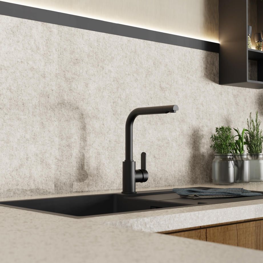 Wasserwerk matte black kitchen faucet mounted on a sink, alternate angle