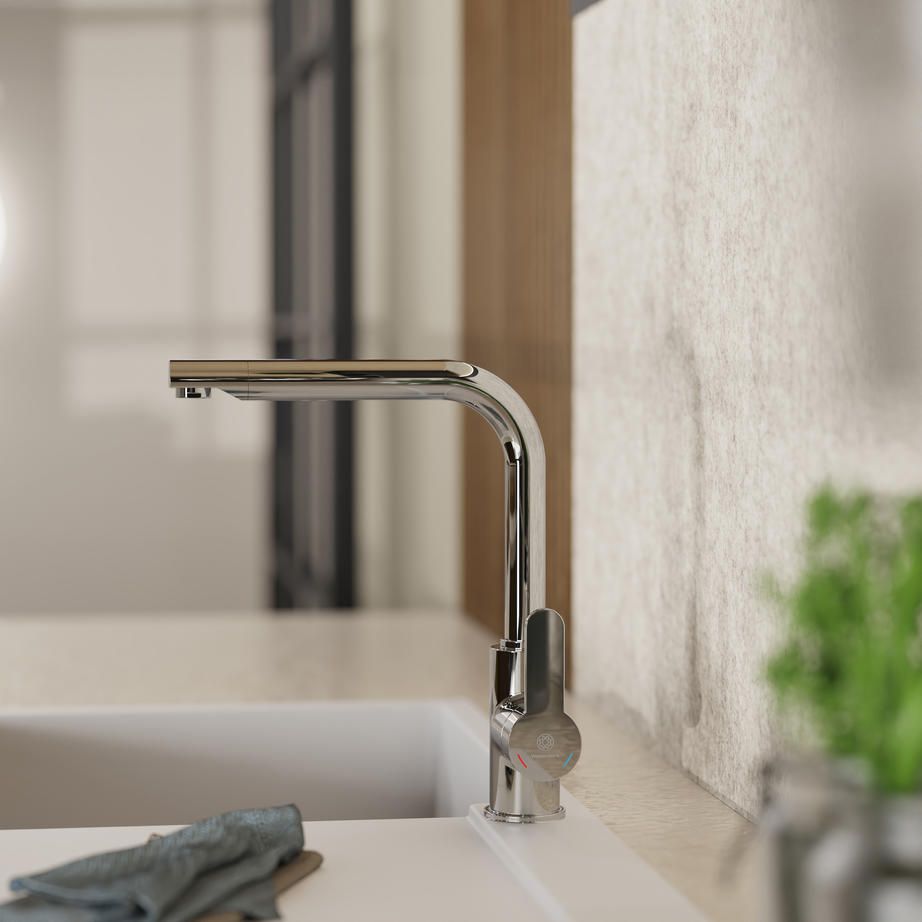 Wasserwerk black and rose gold spring kitchen faucet on a sink